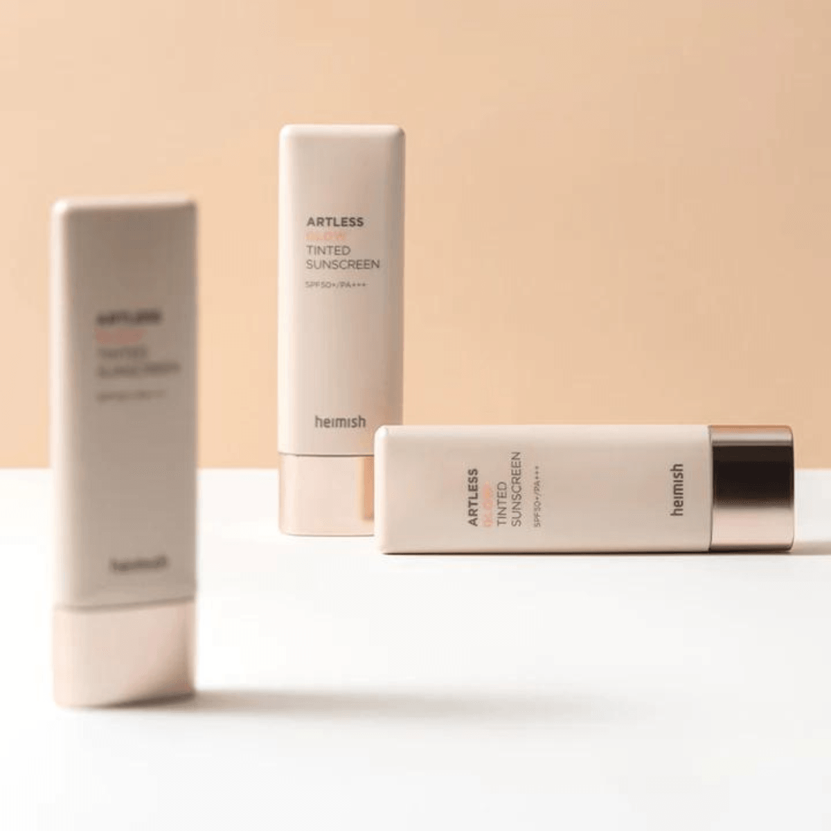 https://cdn.shopify.com/s/files/1/0681/2296/8306/files/HEIMISH-ArtlessGlowTintedSunscreenShineBeigeSPF50_PA_40ML3.png?v=1743011335