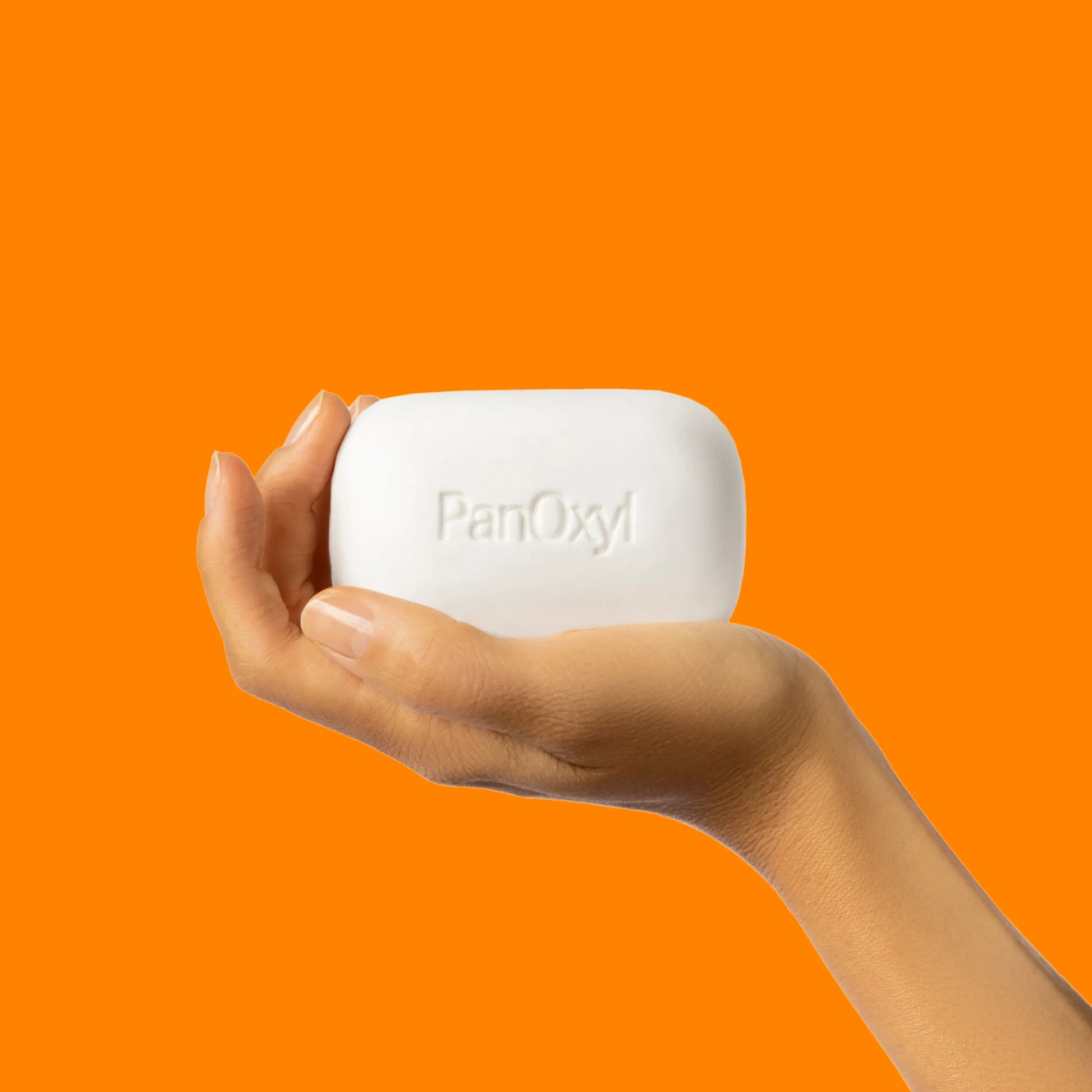 https://panoxyl.com/wp-content/uploads/2023/08/PanOxyl-Acne-Treatment-Bar-in-Hand-scaled.webp