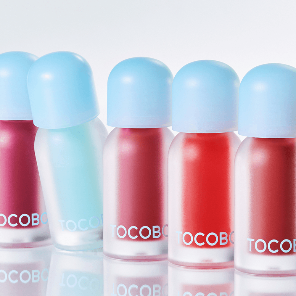 https://cdn.shopify.com/s/files/1/0681/2296/8306/files/TOCOBO-JuicyBerryPlumpingOilLipGloss2.png?v=1776652508