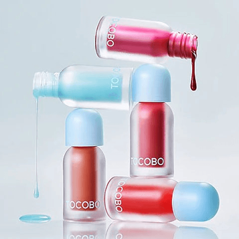 https://cdn.shopify.com/s/files/1/0681/2296/8306/files/TOCOBO-JuicyBerryPlumpingOilLipGloss3.png?v=1776652508